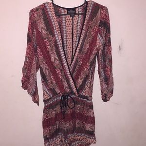 A low cut V-neck romper